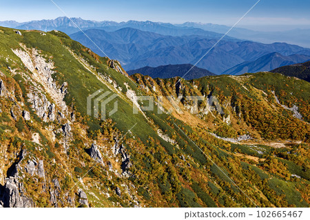 Nogaike Pond and the Northern Alps mountain range seen from the Hokendake ridgeline of the Central Alps Nogaike Pond and the Northern Alps mountain range seen from the Hokendake ridgeline of the Central Alps 102665467