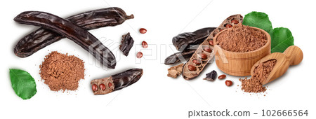 Carob pod and powder isolated on white background with full depth of field. Top view. Flat lay Carob pod and powder isolated on white background with full depth of field. Top view. Flat lay 102666564