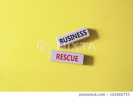 Business rescue symbol. Wooden blocks with words Business rescue. Beautiful yellow background. Business and Business rescue concept. Copy space. 102666755