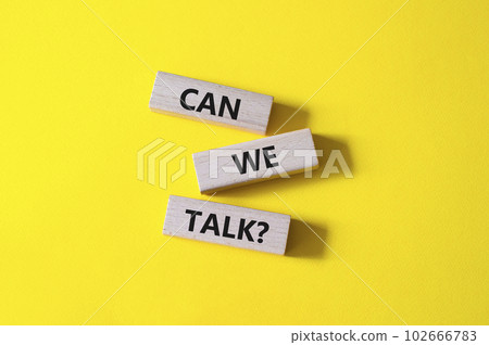 Can we talk symbol. Concept word Can we talk on wooden blocks. Beautiful yellow background. Business and Can we talk concept. Copy space 102666783