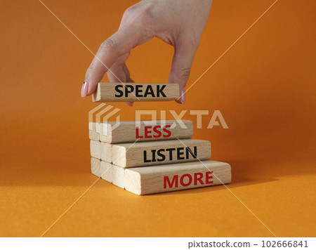 Speak less Listen more symbol. Wooden blocks with words Speak less Listen more. Beautiful orange background. Businessman hand. Business and Speak less Listen more concept. Copy space. Speak less Listen more symbol. Wooden blocks with words Speak less Listen more. Beautiful orange background. Businessman hand. Business and Speak less Listen more concept. Copy space. 102666841