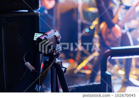 A video camera that shoots videos for distribution at a live house A video camera that shoots videos for distribution at a live house 102670045