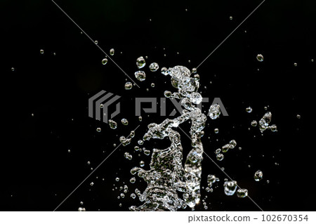 water splash background black background 102670354