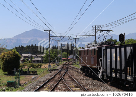 A freight train on the Chichibu Railway with Mt. Buko in the background near Wado-Kurotani Station 102670416