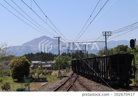 A freight train on the Chichibu Railway with Mt. Buko in the background near Wado-Kurotani Station 102670417