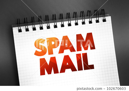 Spam mail - unsolicited and unwanted junk email sent out in bulk to an indiscriminate recipient list, text concept on notepad 102670603