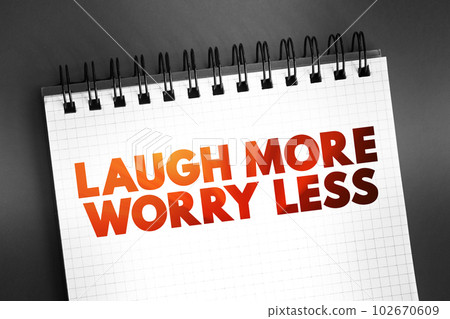 Laugh More Worry Less text quote on notepad, concept background Laugh More Worry Less text quote on notepad, concept background 102670609