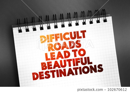 Difficult Roads Lead To Beautiful Destinations text on notepad, concept background Difficult Roads Lead To Beautiful Destinations text on notepad, concept background 102670612