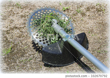 Grass wrapped around the center of the mower blade (illustration style) Grass wrapped around the center of the mower blade (illustration style) 102670792