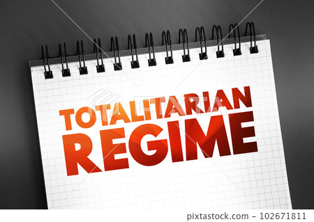 Totalitarian Regime - form of government and political system that prohibits all opposition parties, text concept on notepad Totalitarian Regime - form of government and political system that prohibits all opposition parties, text concept on notepad 102671811