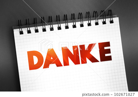 Danke (thank you in german) text quote on notepad, concept background Danke (thank you in german) text quote on notepad, concept background 102671827