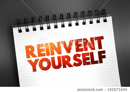 Reinvent Yourself text quote on notepad, concept background 102671849