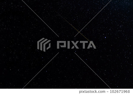 night starry sky and a passing meteorite. Background abstract image night starry sky and a passing meteorite. Background abstract image 102671968