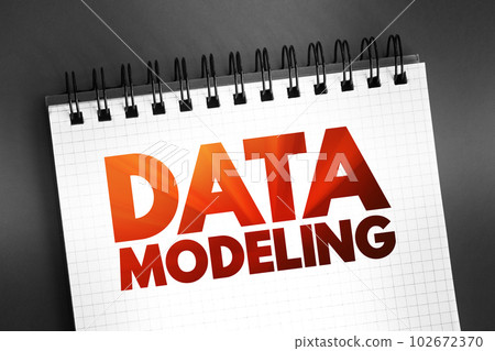 Data modeling - process of creating a data model for an information system by applying certain formal techniques, text on notepad, concept for presentations and reports 102672370