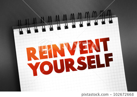 Reinvent Yourself text quote on notepad, concept background 102672668