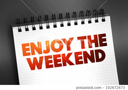 Enjoy the Weekend text quote on notepad, concept background Enjoy the Weekend text quote on notepad, concept background 102672673