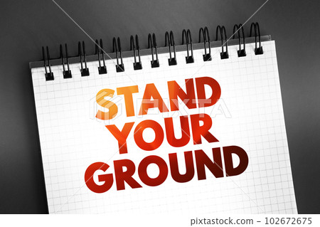 Stand Your Ground text on notepad, concept background Stand Your Ground text on notepad, concept background 102672675