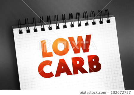 Low Carb - diet means that you eat fewer carbohydrates and a higher proportion of protein and fat, text concept on notepad Low Carb - diet means that you eat fewer carbohydrates and a higher proportion of protein and fat, text concept on notepad 102672737