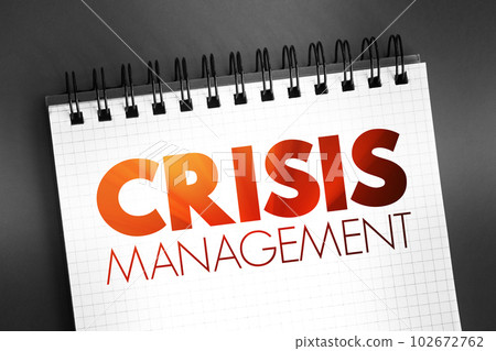 Crisis management - process by which an organization deals with a disruptive and unexpected event that threatens to harm the organization or its stakeholders, text concept on notepad 102672762