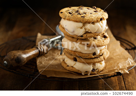 Ice cream sandwiches with chocolate chip cookies Ice cream sandwiches with chocolate chip cookies 102674490