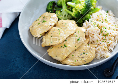 Mustard chicken with rice and broccoli Mustard chicken with rice and broccoli 102674647