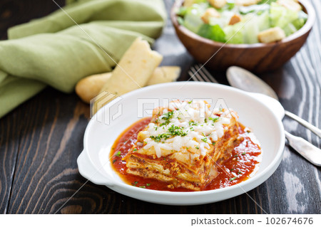 Traditional lasagna on white plate 102674676