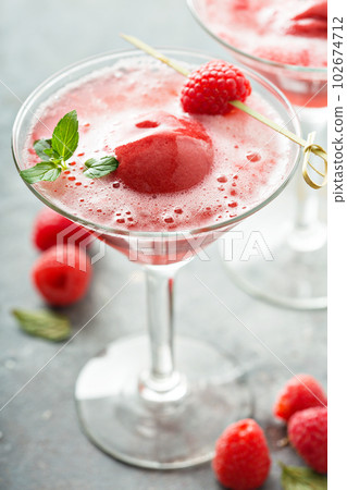 Raspberry sorbet rose floats 102674712