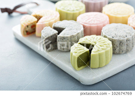 Snow skin sweet and savory traditional Chinese mooncakes 102674769