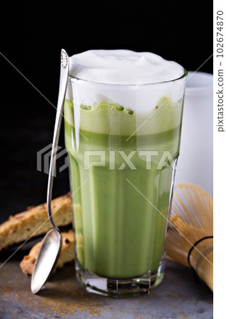 Matcha latte in tall glasses 102674870