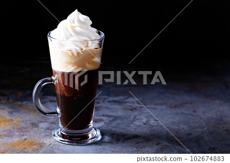 Hot viennese coffee with whipped cream Hot viennese coffee with whipped cream 102674883