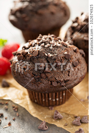 Double chocolate muffins with raspberry 102674925