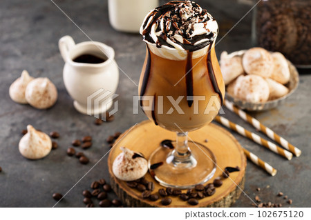 Iced coffee with whipped cream 102675120