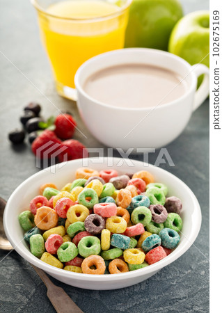 Fruit colorful sweet cereals with juice and cocoa Fruit colorful sweet cereals with juice and cocoa 102675169