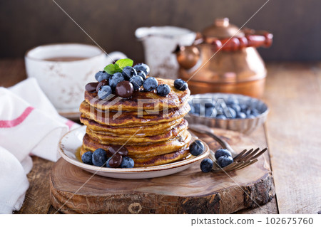 Pumpkin pancakes with blueberries Pumpkin pancakes with blueberries 102675760