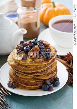 Pumpkin pancakes with blueberries 102675795