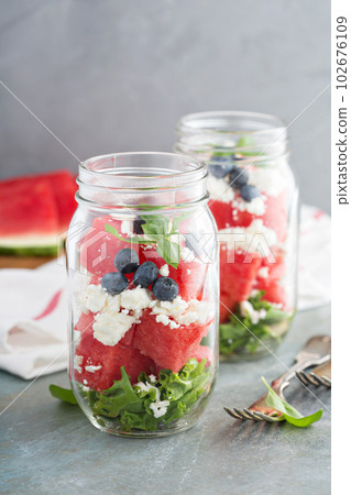Watermelon salad in a jar with feta 102676109