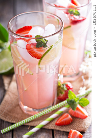 Strawberry lime lemonade in tall glasses Strawberry lime lemonade in tall glasses 102676113
