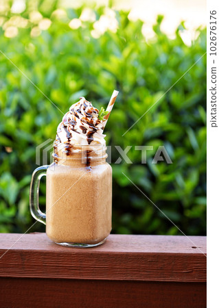 Chocolate frappe coffee with whipped cream outside Chocolate frappe coffee with whipped cream outside 102676176