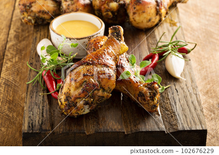 Grilled chicken drumsticks 102676229