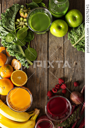 Variety of fresh vegetable and fruit juices Variety of fresh vegetable and fruit juices 102676241
