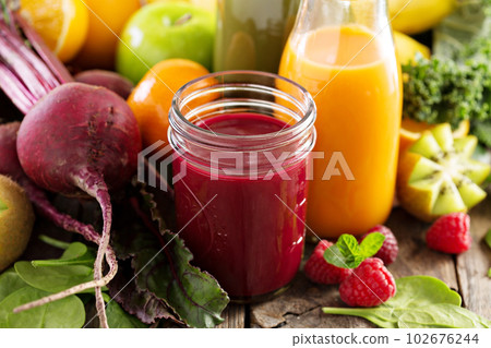 Variety of fresh vegetable and fruit juices Variety of fresh vegetable and fruit juices 102676244