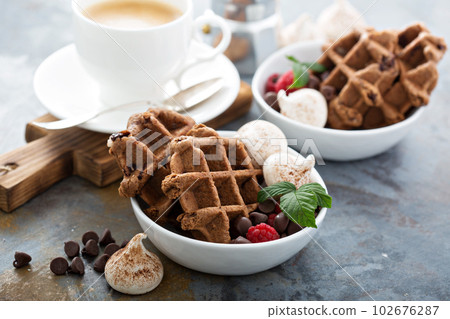 Chocolate waffles with meringues and coffee 102676287