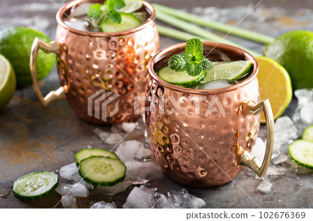 Moscow mule cocktail with lime and cucumber Moscow mule cocktail with lime and cucumber 102676369