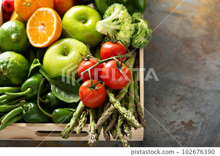 Fresh colorful vegetables and fruits 102676390