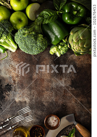 Variety of green vegetables and fruits 102676453