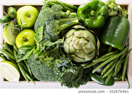 Variety of green vegetables and fruits 102676461