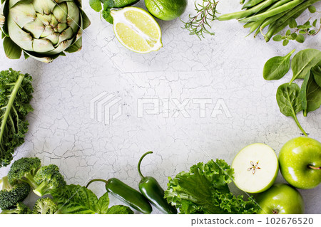 Variety of green vegetables and fruits 102676520