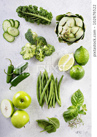 Variety of green vegetables and fruits 102676522