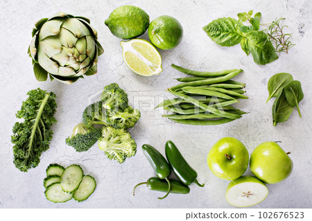 Variety of green vegetables and fruits 102676523