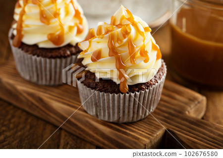 Homemade butterscotch cupcakes 102676580